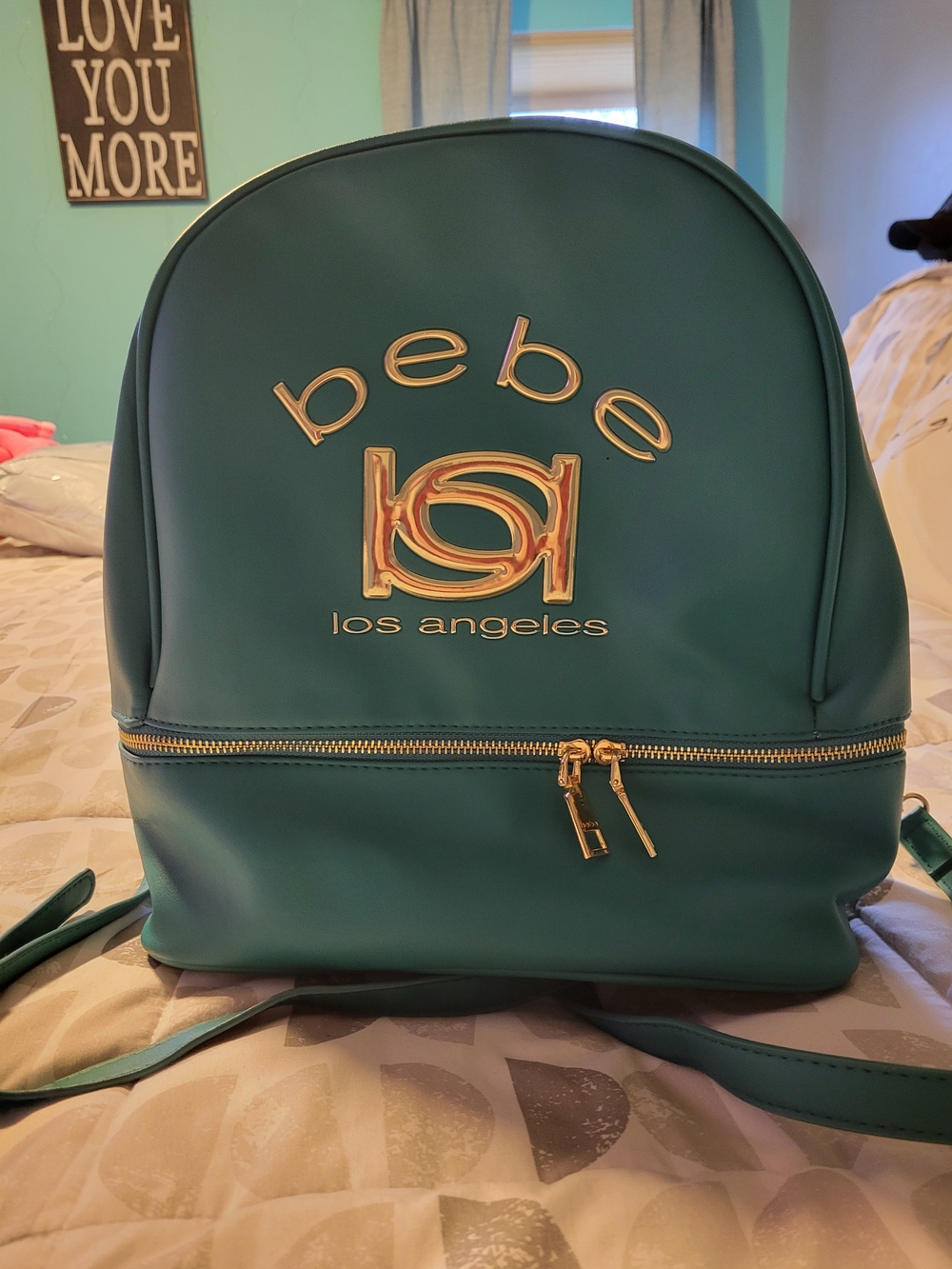 bebe Los Angeles Teal Backpack with Gold Hardware